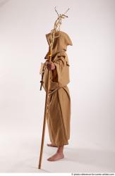 JOEL_ADAMSON STANDING POSE WITH A MAGIC STICK